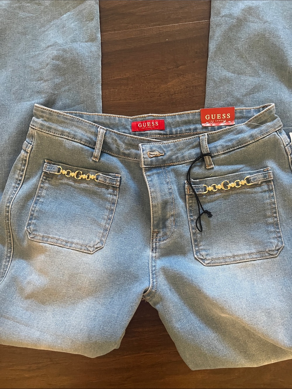 GUESS Light Blue High-Rise Women's Jeans with Gold-Tone Pocket Trim